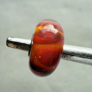 ✨ Authentic Early Trollbeads Glass Bead – Retired Swirl Amber/Red Variant✨